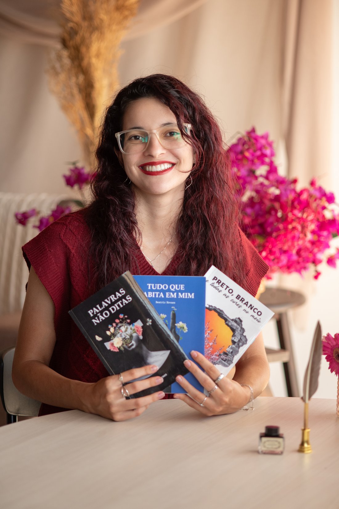 Beatriz com seus livros
